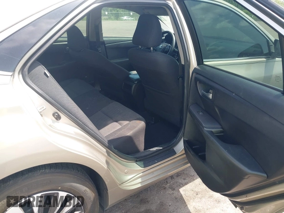 2016 Toyota Camry XLE with VIN 4T1BF1FKXGU259860, listed as a IAAI auction lot 42219507 with 239,145 mi miles and . Bid and sale history available at DreamBid. Image 8.