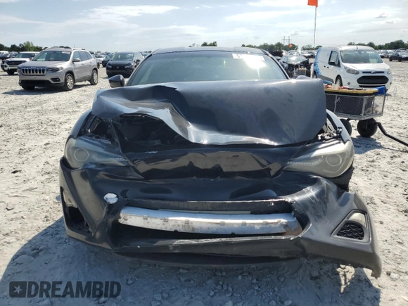 2014 Scion FR-S z VIN JF1ZNAA1XE8707871, wystawiony jako Copart lot #57945695 z przebiegiem 140 517 mil mil oraz Czysty tytuł • Clean title. Historia ofert i sprzedaży dostępna na DreamBid. Obrazek 5.