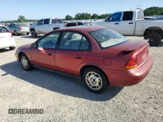 1996 Saturn SL with VIN 1G8ZK5278TZ334649, listed as a Copart auction lot 54098725 with 156,012 mi miles and Salvage Title. Bid and sale history available at carsss.com. Image 2.
