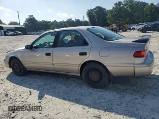 2001 Toyota Camry CE z VIN 4T1BG22KX1U774132, wystawiony jako Copart lot #57632885 z przebiegiem 179 771 mil mil oraz Szkoda całkowita • Salvage title. Historia ofert i sprzedaży dostępna na DreamBid. Obrazek 2.