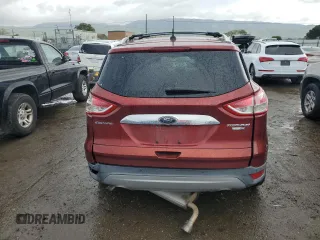 2016 Ford Escape Titanium with VIN 1FMCU9J91GUA99767, listed as a Copart auction lot 51172655 with 132,911 mi miles and Salvage title. Bid and sale history available at DreamBid. Image 6.