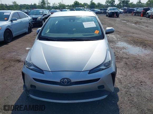 2022 Toyota Prius L Eco z VIN JTDKAMFU2N3165805, wystawiony jako IAAI lot #42428676 z przebiegiem 435 471 mil mil oraz . Historia ofert i sprzedaży dostępna na DreamBid. Obrazek 12.