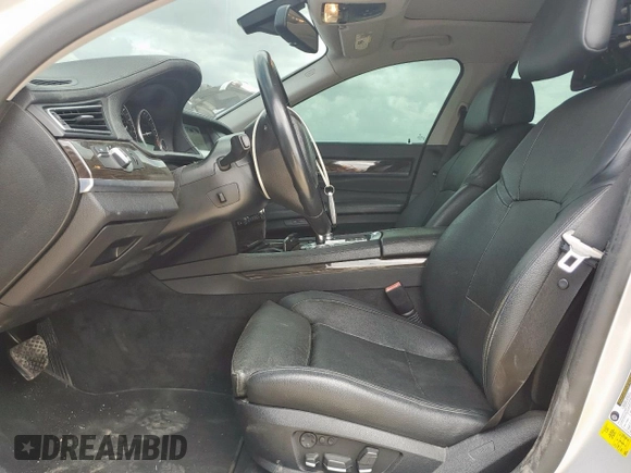 2012 BMW 7 Series 740i with VIN WBAKA4C5XCC613599, listed as a Copart auction lot 62951835 with 102,534 mi miles and Clean title. Bid and sale history available at DreamBid. Image 7.