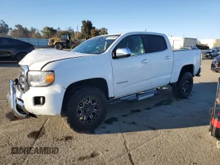 2018 GMC Canyon 4WD SLT z VIN 1GTG6DEN3J1143092, wystawiony jako Copart lot #46322305 z przebiegiem 64 599 mil mil oraz Szkoda całkowita • Salvage title. Historia ofert i sprzedaży dostępna na DreamBid. Obrazek 1.