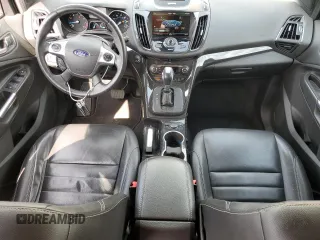 2015 Ford Escape Titanium with VIN 1FMCU0J99FUA16290, listed as a Copart auction lot 52496855 with 107,674 mi miles and Salvage Title. Bid and sale history available at DreamBid. Image 8.