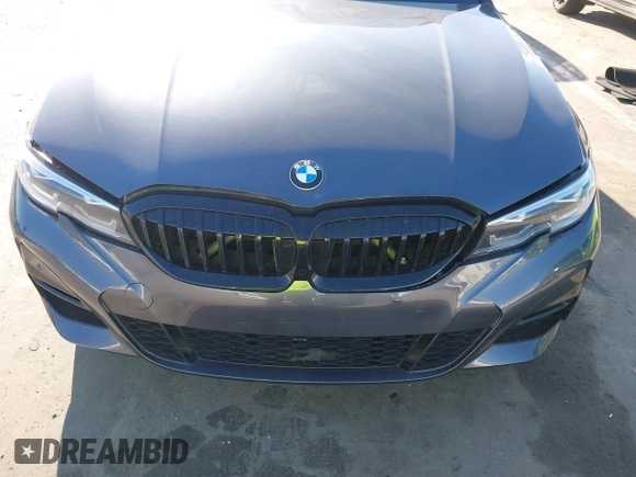 2021 BMW 3 Series 330i z VIN 3MW5R1J08M8B94401, wystawiony jako IAAI lot #41760747 z przebiegiem Nie podano mil oraz . Historia ofert i sprzedaży dostępna na DreamBid. Obrazek 12.