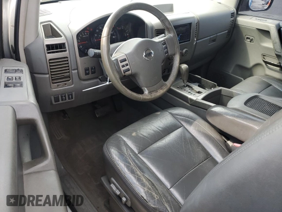 2006 Nissan Titan SE с VIN 1N6BA06A16N571799, выставлен на аукционе Copart как лот 46093745 с пробегом 118 019 миль миль и Списание • Salvage title. История ставок и продаж доступна на DreamBid. Изображение 8.