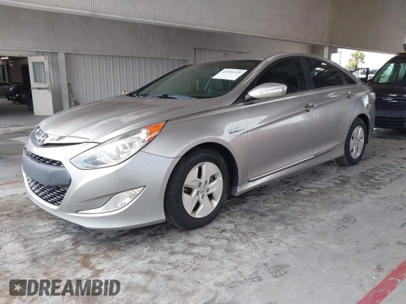 2012 Hyundai Sonata Hybrid z VIN KMHEC4A47CA060132, wystawiony jako IAAI lot #42391529 z przebiegiem 111 293 mil mil oraz . Historia ofert i sprzedaży dostępna na DreamBid. Obrazek 2.