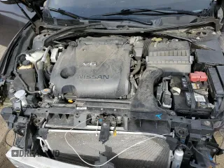 2016 Nissan Maxima SR with VIN 1N4AA6AP9GC447540, listed as a Copart auction lot 60861815 with 127,420 mi miles and Salvage title. Bid and sale history available at DreamBid. Image 11.
