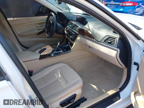 2014 BMW 3 Series 328i xDrive with VIN WBA3B3C55EJ979836, listed as a IAAI auction lot 41886624 with 140,684 mi miles. Bid and sale history available at carsss.com. Image 5.