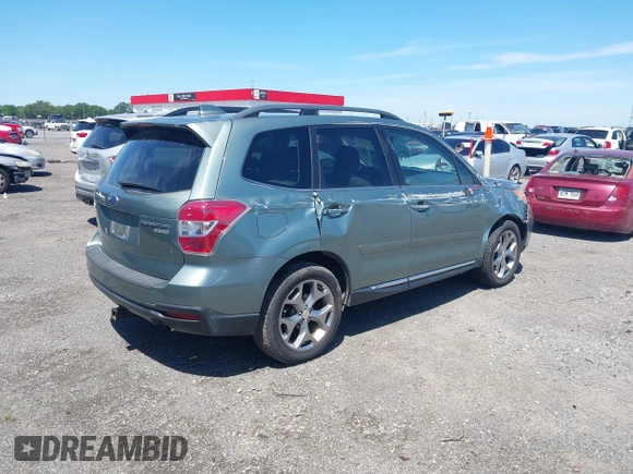 2016 Subaru Forester Touring with VIN JF2SJAVCXGH490507, listed as a IAAI auction lot 42070715 with 98,456 mi miles and . Bid and sale history available at DreamBid. Image 4.