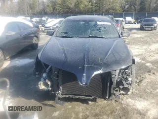2016 Lincoln MKS z VIN 1LNHL9DK0GG600153, wystawiony jako Copart lot #41561325 z przebiegiem 71 909 mil mil oraz Szkoda całkowita • Salvage title. Historia ofert i sprzedaży dostępna na DreamBid. Obrazek 5.
