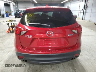 2016 Mazda CX-5 Touring z VIN JM3KE4CY6G0647362, wystawiony jako Copart lot #58081855 z przebiegiem 86 372 mil mil oraz Szkoda całkowita • Salvage title. Historia ofert i sprzedaży dostępna na DreamBid. Obrazek 6.