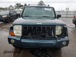 2006 Jeep Commander with VIN 1J8HH48NX6C125803, listed as a Copart auction lot 71247304 with 214,297 mi miles and Salvage Title. Bid and sale history available at carsss.com. Image 5.
