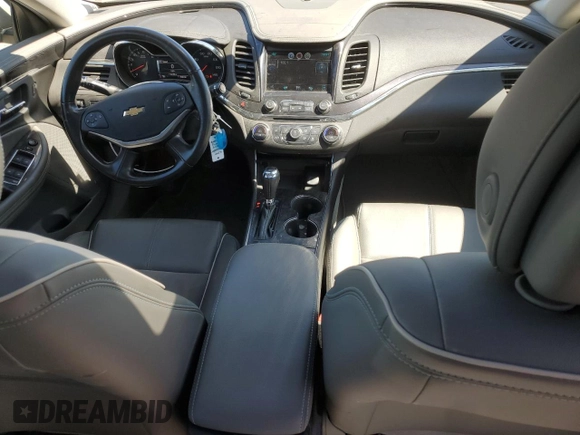 2014 Chevrolet Impala LT with VIN 2G1115SL2E9112424, listed as a Copart auction lot 49663245 with 112,140 mi miles and Salvage Title. Bid and sale history available at DreamBid. Image 8.