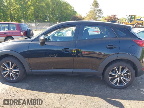 2018 Mazda CX-3 Touring z VIN JM1DKFC73J0321605, wystawiony jako IAAI lot #42355269 z przebiegiem 40 053 mil mil oraz . Historia ofert i sprzedaży dostępna na DreamBid. Obrazek 14.