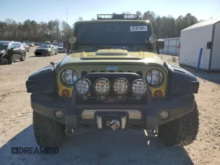 2008 Jeep Wrangler Rubicon с VIN 1J4GA64198L518646, выставлен на аукционе Copart как лот 82381084 с пробегом Не указан миль и Списание • Salvage title. История ставок и продаж доступна на DreamBid. Изображение 5.