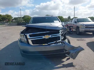 2020 Chevrolet Suburban LT z VIN 1GNSCHKC8LR157188, wystawiony jako IAAI lot #41578614 z przebiegiem 82 566 mil mil oraz . Historia ofert i sprzedaży dostępna na DreamBid. Obrazek 12.
