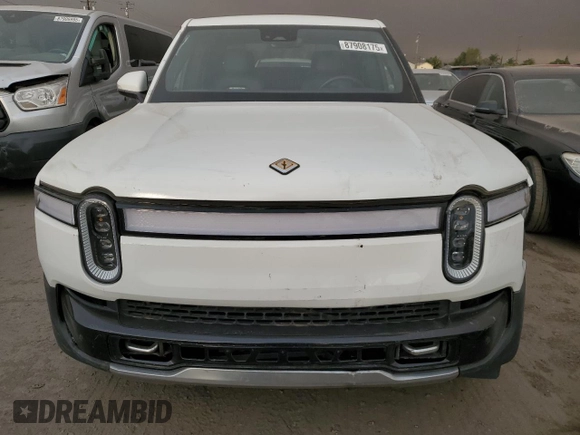 2022 Rivian R1T Adventure z VIN 7FCTGAAA9NN014280, wystawiony jako Copart lot #87908175 z przebiegiem 28 601 mil mil oraz Szkody całkowita. Historia ofert i sprzedaży dostępna na DreamBid. Obrazek 5.