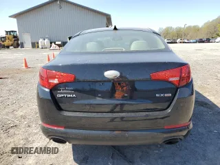 2013 Kia Optima EX z VIN 5XXGN4A71DG197381, wystawiony jako Copart lot #53619615 z przebiegiem 100 873 mil mil oraz Szkoda całkowita • Salvage title. Historia ofert i sprzedaży dostępna na DreamBid. Obrazek 6.