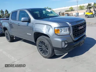 2022 GMC Canyon 4WD Elevation z VIN 1GTG6CENXN1304361, wystawiony jako IAAI lot #41990960 z przebiegiem 23 151 mil mil oraz . Historia ofert i sprzedaży dostępna na DreamBid. Obrazek 1.