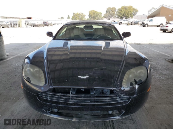 2009 Aston Martin Vantage z VIN SCFBF04CX9GD11858, wystawiony jako Copart lot #53907885 z przebiegiem 87 495 mil mil oraz Szkody całkowita. Historia ofert i sprzedaży dostępna na DreamBid. Obrazek 5.