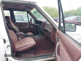 1991 Jeep Cherokee with VIN 1J4FJ58S3ML563620, listed as a IAAI auction lot 42131093 with 198,942 mi miles and . Bid and sale history available at DreamBid. Image 5.
