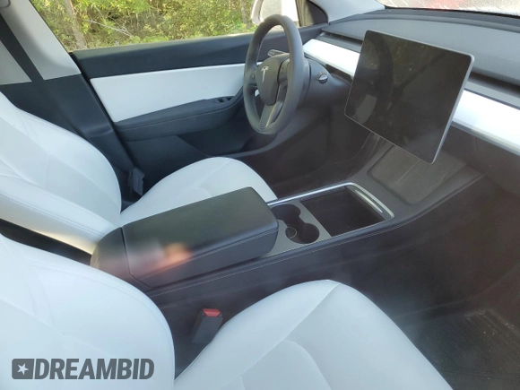 2022 Tesla Model Y Performance with VIN 7SAYGDEF3NF516349, listed as a Copart auction lot 63759245 with Not provided miles and Salvage title. Bid and sale history available at DreamBid. Image 8.