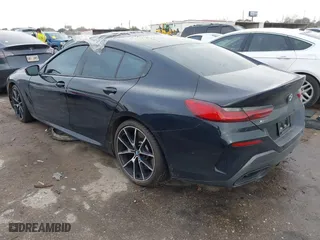 2021 BMW 8 Series M850i with VIN WBAGV8C03MCG68700, listed as a IAAI auction lot 41684696 with 18,516 mi miles. Bid and sale history available at carsss.com. Image 3.