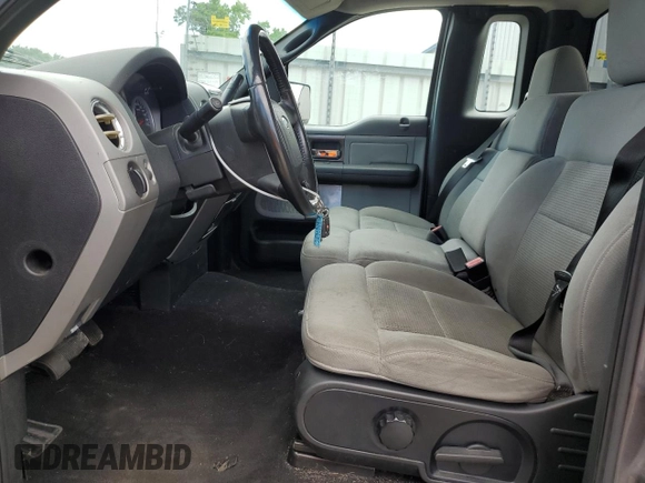 2004 Ford F-150 XLT with VIN 1FTRF04574KA07615, listed as a Copart auction lot 56535705 with 106,747 mi miles and Clean title. Bid and sale history available at DreamBid. Image 7.