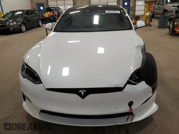 2023 Tesla Model S с VIN 5YJSA1E5XPF520265, выставлен на аукционе Copart как лот 54833255 с пробегом 16 502 миль миль и Списание • Salvage title. История ставок и продаж доступна на DreamBid. Изображение 5.
