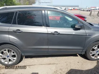 2014 Ford Escape Titanium with VIN 1FMCU9J98EUB66961, listed as a IAAI auction lot 42057914 with 101,943 mi miles. Bid and sale history available at carsss.com. Image 13.