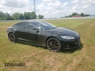 2014 Tesla Model S 60 with VIN 5YJSA1S16EFP50982, listed as a Copart auction lot 54426015 with 76,515 mi miles and Salvage title. Bid and sale history available at DreamBid. Image 13.