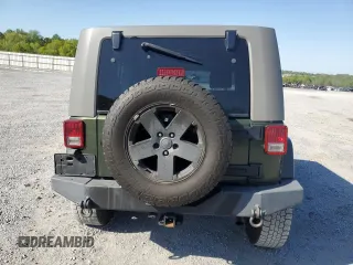 2008 Jeep Wrangler Unlimited Sahara with VIN 1J4GA59148L504608, listed as a Copart auction lot 52400325 with 123,959 mi miles and Salvage Title. Bid and sale history available at carsss.com. Image 6.