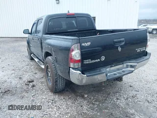 2014 Toyota Tacoma PreRunner with VIN 5TFJU4GN0EX062336, listed as a IAAI auction lot 41073030 with 135,554 mi miles. Bid and sale history available at carsss.com. Image 3.