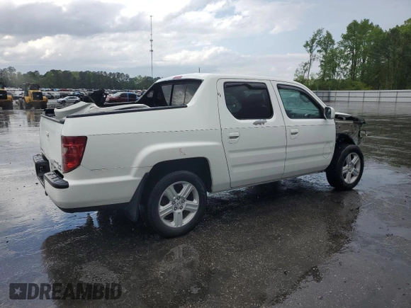 2010 Honda Ridgeline RTL z VIN 5FPYK1F53AB006195, wystawiony jako Copart lot #52528435 z przebiegiem 205 522 mil mil oraz Szkoda całkowita • Salvage title. Historia ofert i sprzedaży dostępna na DreamBid. Obrazek 3.