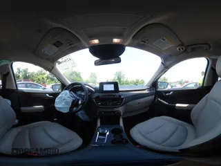 2020 Ford Escape Titanium z VIN 1FMCU9J90LUA39747, wystawiony jako IAAI lot #42369890 z przebiegiem 31 425 mil mil oraz . Historia ofert i sprzedaży dostępna na DreamBid. Obrazek 20.