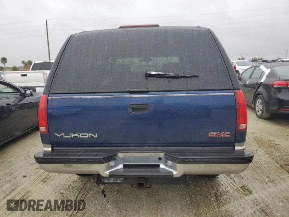 1999 GMC Yukon with VIN 1GKEK13R2XJ739931, listed as a Copart auction lot 74583734 with 115,605 mi miles and Salvage Title. Bid and sale history available at carsss.com. Image 6.