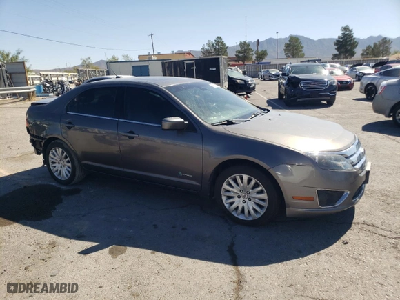 2011 Ford Fusion Hybrid with VIN 3FADP0L39BR329534, listed as a Copart auction lot 69272883 with 191,524 mi miles and Salvage Title. Bid and sale history available at carsss.com. Image 4.
