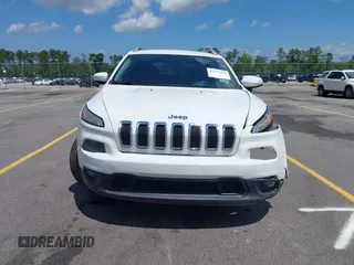 2016 Jeep Cherokee Latitude with VIN 1C4PJLCB0GW291357, listed as a IAAI auction lot 42312356 with 105,692 mi miles and . Bid and sale history available at DreamBid. Image 13.