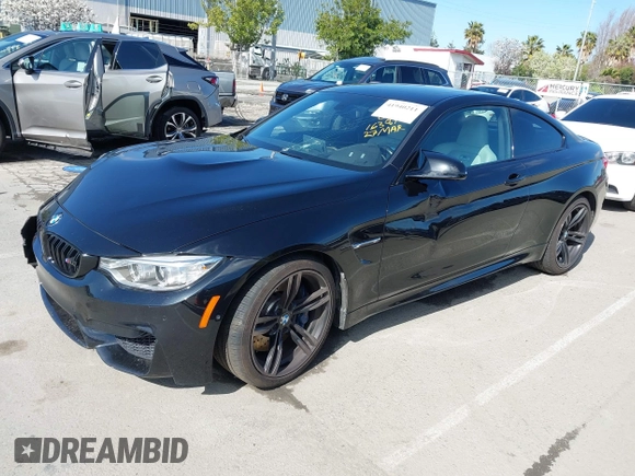 2015 BMW M4 with VIN WBS3R9C58FK334247, listed as a IAAI auction lot 41940211 with 125,881 mi miles. Bid and sale history available at carsss.com. Image 16.