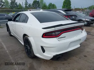 2018 Dodge Charger R/T with VIN 2C3CDXCT9JH265601, listed as a IAAI auction lot 41979466 with 107,842 mi miles and . Bid and sale history available at DreamBid. Image 3.