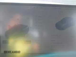 2024 Tesla Model Y Long Range z VIN 7SAYGDEE8RA262082, wystawiony jako IAAI lot #41834216 z przebiegiem 11 536 mil mil oraz . Historia ofert i sprzedaży dostępna na DreamBid. Obrazek 7.