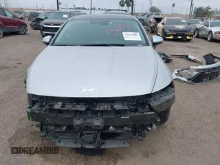 2024 Hyundai Sonata Hybrid Limited with VIN KMHL54JJ1RA087584, listed as a IAAI auction lot 41615405 with 18,684 mi miles. Bid and sale history available at carsss.com. Image 13.
