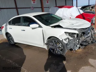 2016 Nissan Altima 2.5 S with VIN 1N4AL3AP6GC188174, listed as a IAAI auction lot 41383084 with 166,182 mi miles. Bid and sale history available at carsss.com. Image 14.