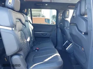 2025 Rivian R1S Adventure with VIN 7PDSGBBA4SN047584, listed as a IAAI auction lot 41372645 with 501 mi miles. Bid and sale history available at carsss.com. Image 8.
