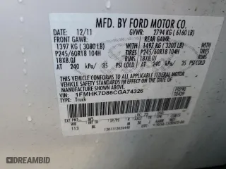 2012 Ford Explorer XLT with VIN 1FMHK7D86CGA74326, listed as a Copart auction lot 77353274 with 136,524 mi miles and Salvage Title. Bid and sale history available at carsss.com. Image 12.