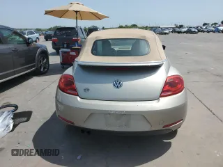 2015 Volkswagen Beetle 1.8T с VIN 3VW517AT5FM804169, выставлен на аукционе Copart как лот 65981544 с пробегом 104 754 миль миль и Списание • Salvage title. История ставок и продаж доступна на DreamBid. Изображение 6.