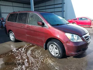 2007 Honda Odyssey EX-L z VIN 5FNRL387X7B416523, wystawiony jako IAAI lot #42245359 z przebiegiem 224 645 mil mil oraz . Historia ofert i sprzedaży dostępna na DreamBid. Obrazek 1.