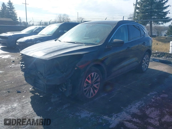 2021 Ford Escape Titanium с VIN 1FMCU9J90MUB23259, выставлен на аукционе IAAI как лот 41535706 с пробегом 100 664 миль миль и . История ставок и продаж доступна на DreamBid. Изображение 17.